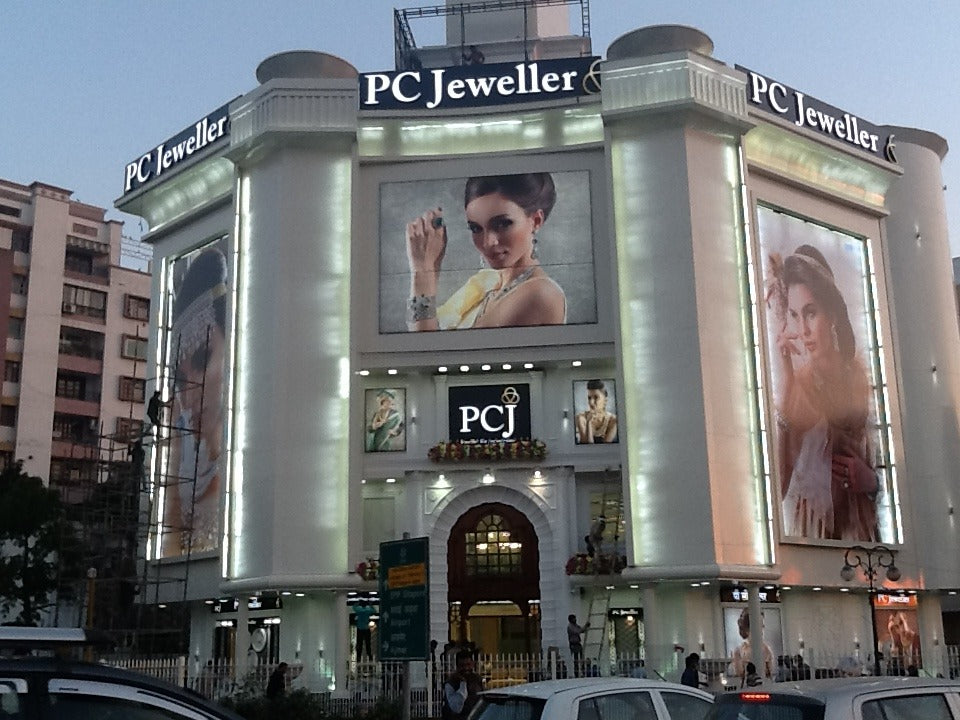 PC Jeweller showroom building in Jaipur at dusk