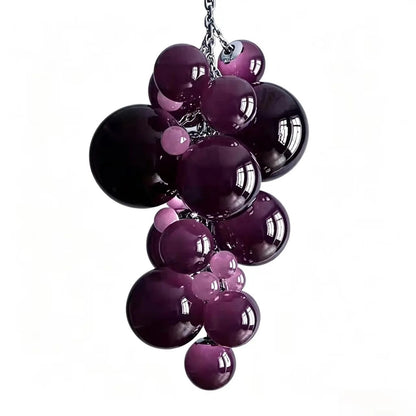 Vertical grape-bunch cluster chandelier of glossy deep plum and frosted pink hand-blown glass globes on a chrome chain