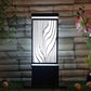 Black iron gate light with laser-cut wave pattern by Eliante, as supplied to M3M Smart World GEMS, Gurugram – lit