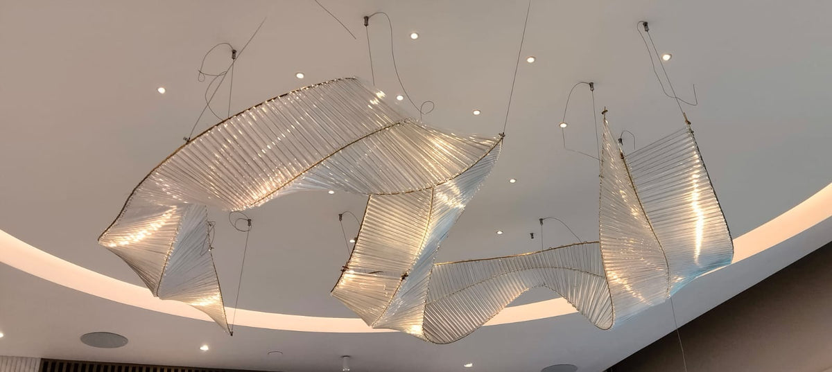 Close view of the flowing crystal and glass rod ribbons