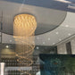 The spiral crystal chandelier seen through the glass entrance of the lobby, Chennai