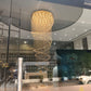 Spiral crystal butterfly chandelier seen through the glass entrance
