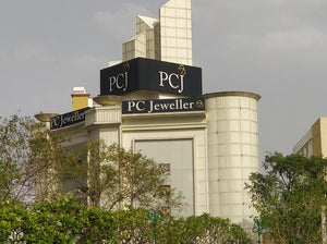 PC Jeweller showroom building by day