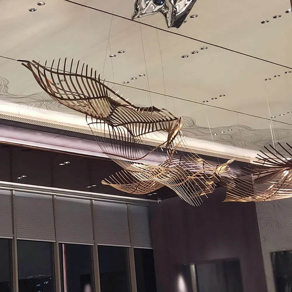 Close-up of the interlocking curved bronze metal ribs forming a twisting organic wave canopy