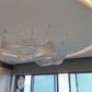 Crystal ribbon chandelier on site during final installation