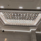 Wide view of the rectangular glass flower ceiling chandelier showing the dense amber perimeter and illuminated core