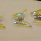 Close view of the K9 crystal butterflies used in the spiral chandelier