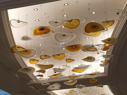 Amber Glass Disk Cluster Chandelier – A Statement Canopy for Double-Height Spaces