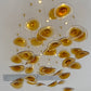 Amber Glass Disk Cluster Chandelier – A Statement Canopy for Double-Height Spaces