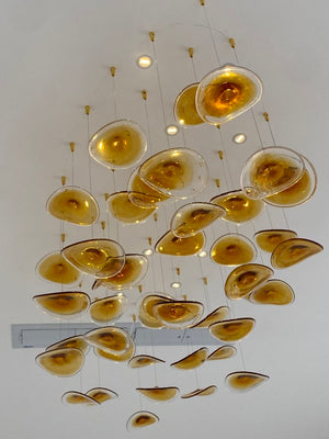 Amber Glass Disk Cluster Chandelier – A Statement Canopy for Double-Height Spaces