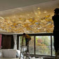 Amber Glass Disk Cluster Chandelier – A Statement Canopy for Double-Height Spaces