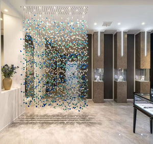 Cascading Sea-Glass Waterfall Chandelier – A Dramatic Screen for Double-Height Interiors