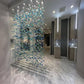 Cascading Sea-Glass Waterfall Chandelier – A Dramatic Screen for Double-Height Interiors