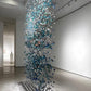 Aquamarine Sea-Glass Canopy Chandelier – A Room-Divider Statement for Double-Height Spaces