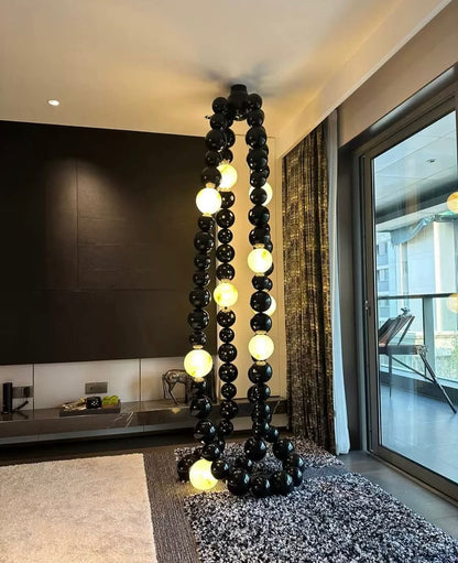 Onyx Sphere Cascade Chandelier – A Sculptural Statement for Double-Height Spaces