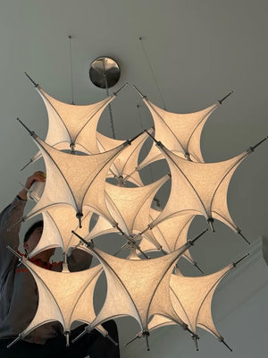 Tensile Fabric Starburst Chandelier – A Sculptural Statement for Double-Height Lobbies