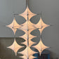 Tensile Fabric Starburst Chandelier – A Sculptural Statement for Double-Height Lobbies