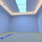 Office lighting design render — open workspace with cove lighting and a ceiling light panel