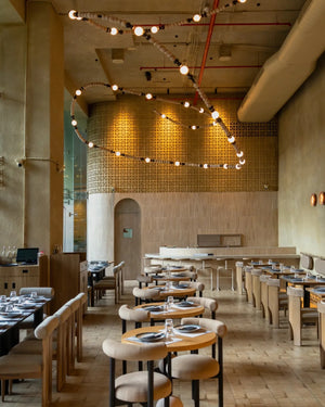 Honey Bead Wood & Glass Serpentine Chandelier – A Flowing Statement for Dining Spaces