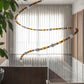 Amber Bead Wood & Glass Loop Chandelier – A Sculptural Statement for Double-Height Dining
