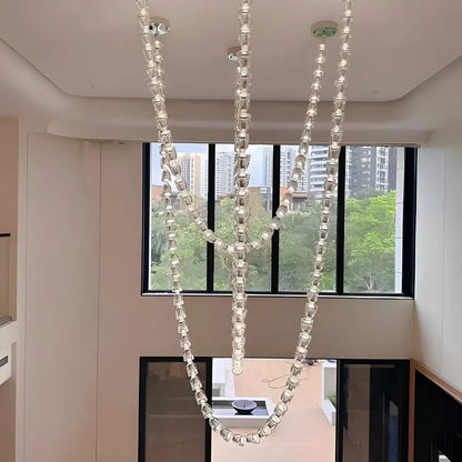 Elysian Crystal Cascade Chandelier – Modern Luxury Sculptural Crystal Hanging Light for Double Height Spaces