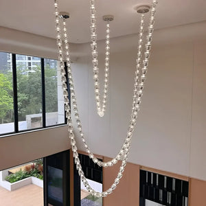 Elysian Crystal Cascade Chandelier – Modern Luxury Sculptural Crystal Hanging Light for Double Height Spaces