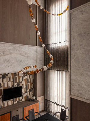 Amber Bead Wood & Glass Loop Chandelier – A Sculptural Statement for Double-Height Dining