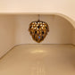 Amber Quill Glass Bloom Chandelier installed in a grand foyer, warm ambient glow