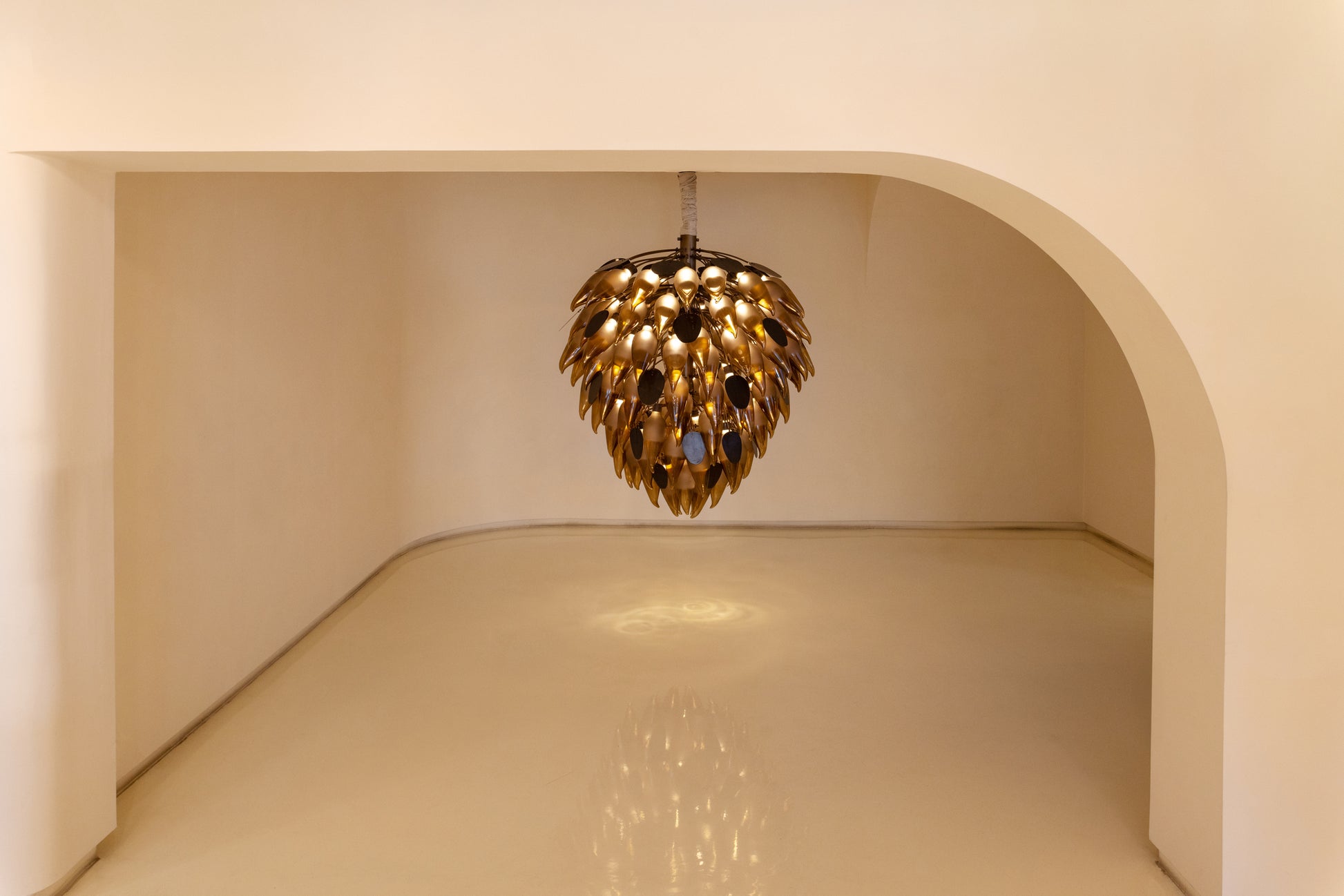 Amber Quill Glass Bloom Chandelier installed in a grand foyer, warm ambient glow