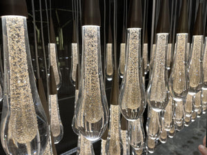 Cascading Crystal Teardrop Chandelier – A Linear Statement for Reception Foyers