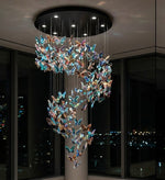 Iridescent Butterfly Flight Chandelier - custom cascading glass butterfly swarm chandelier for double-height interiors