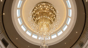 Crystal Cascade Dome Chandelier - dome-shaped crystal cluster cascading over a double-height foyer