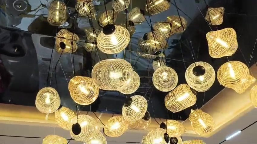 Looking up into the finished ribbed glass cluster chandelier, Delhi residence