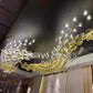 Signature Floating Wave Chandelier Installation for Shilpa Jewellers, Rajkot – Custom White & Gold Sculptural Lighting Designed for a Grand Double-Height Lobby