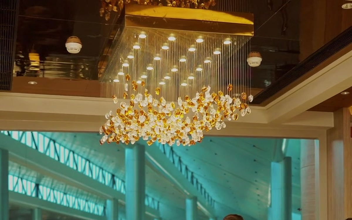 Custom stone and crystal chandelier over the Encalm Privé reception, Hyderabad airport (photo: Encalm Hospitality)