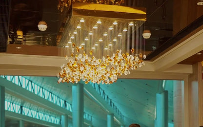 Custom stone and crystal chandelier over the Encalm Privé reception, Hyderabad airport (photo: Encalm Hospitality)