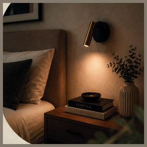 Eva Spot reading wall light in a bedroom setting