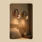 Luna Spot Light, rose gold and gold finishes in a bedroom setting