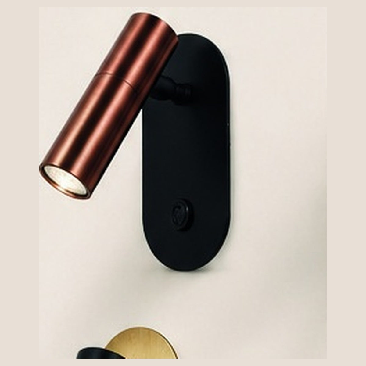 Oval Spot reading wall light, copper finish