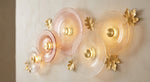 Amber Ripple Glass Wall Chandelier – A Gilded Leaf-Accented Illuminated Sculpture