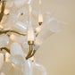Close-up detail of hand-blown opalescent glass petals on the chandelier