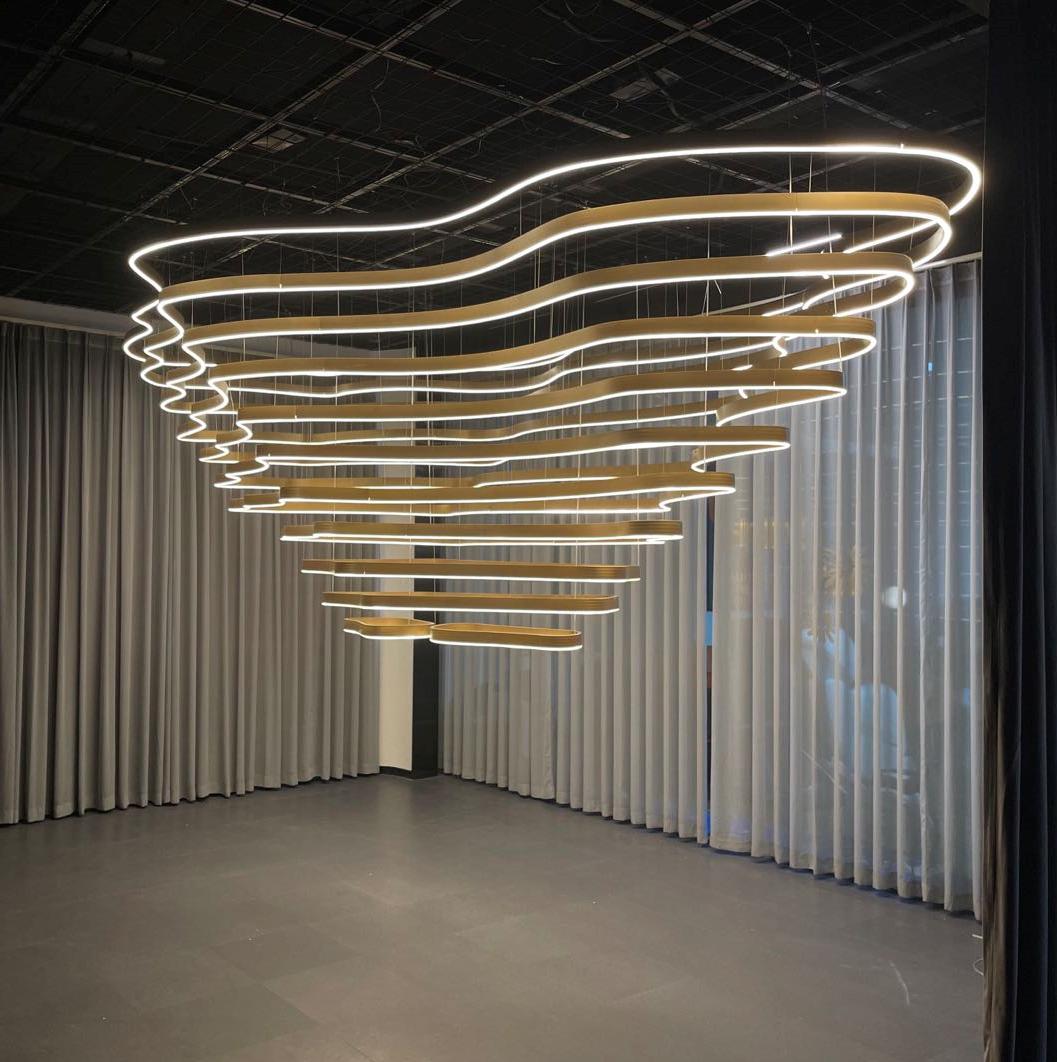 Undulating Ring Cascade LED Chandelier – A Sculptural Statement for Double-Height Lobbies