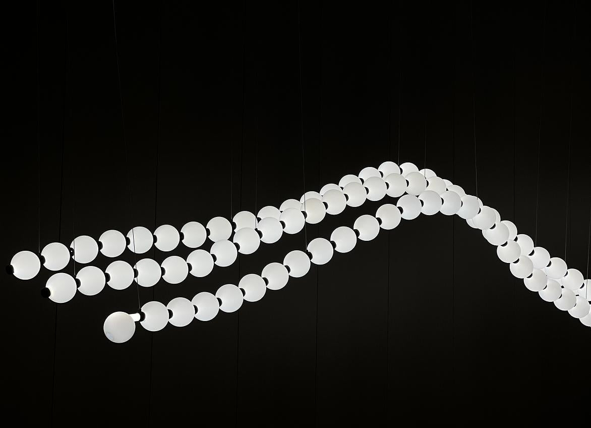 Floating Pearl Wave Chandelier – A Sculptural Statement for Double-Height Spaces
