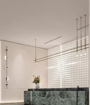 Linear Rod Chandelier with Orb Drops – A Refined Accent for Reception Counters