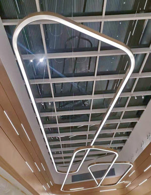Abstract Geometric Loop Chandelier – A Sculptural Statement for Mall Atriums