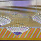 Row of fan blade pendant chandeliers hung at varied heights