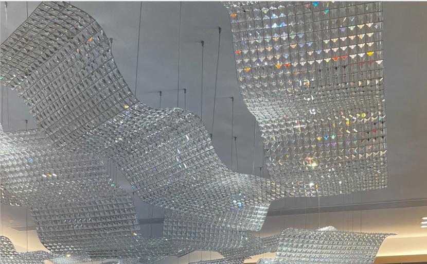 Crystal Tessellation Wave Chandelier installed in a grand lobby ceiling