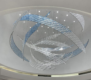 Swirling Feather Crystal Chandelier – A Dynamic Statement for Circular Atriums