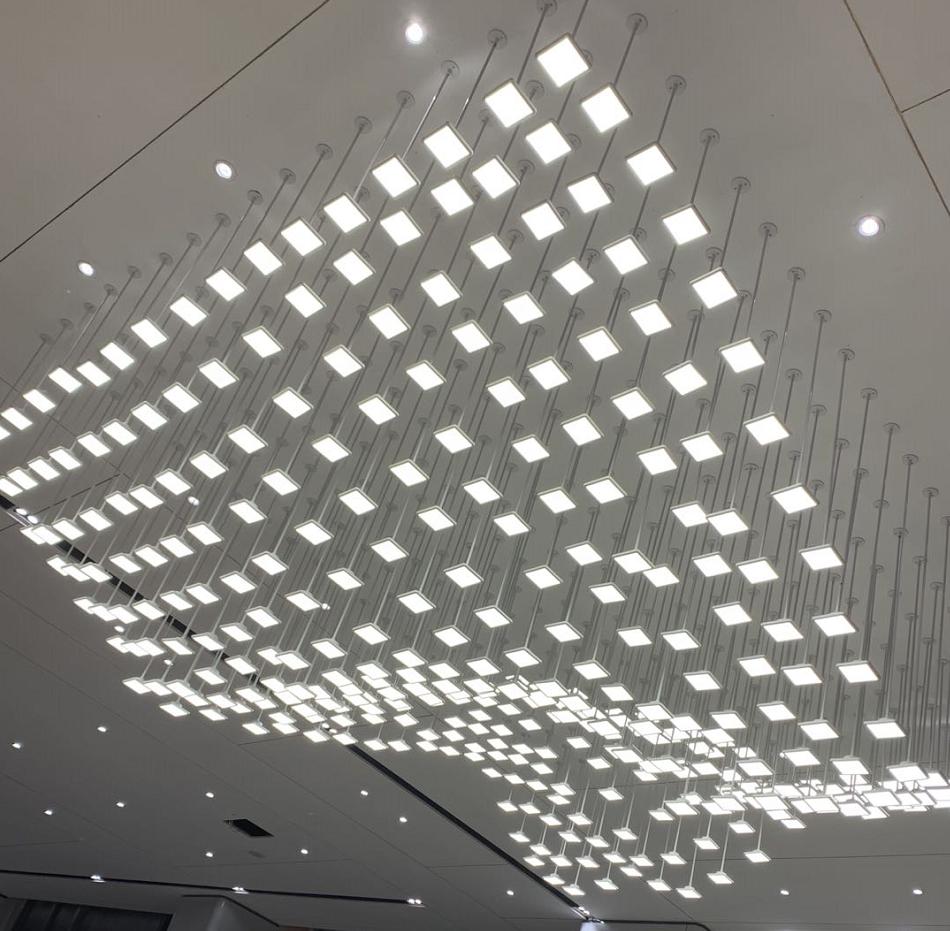 Floating Tile Cascade Chandelier – A Wave-Inspired Installation for Grand Lobbies