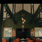 Clustered pendant light fixture over the restaurant seating